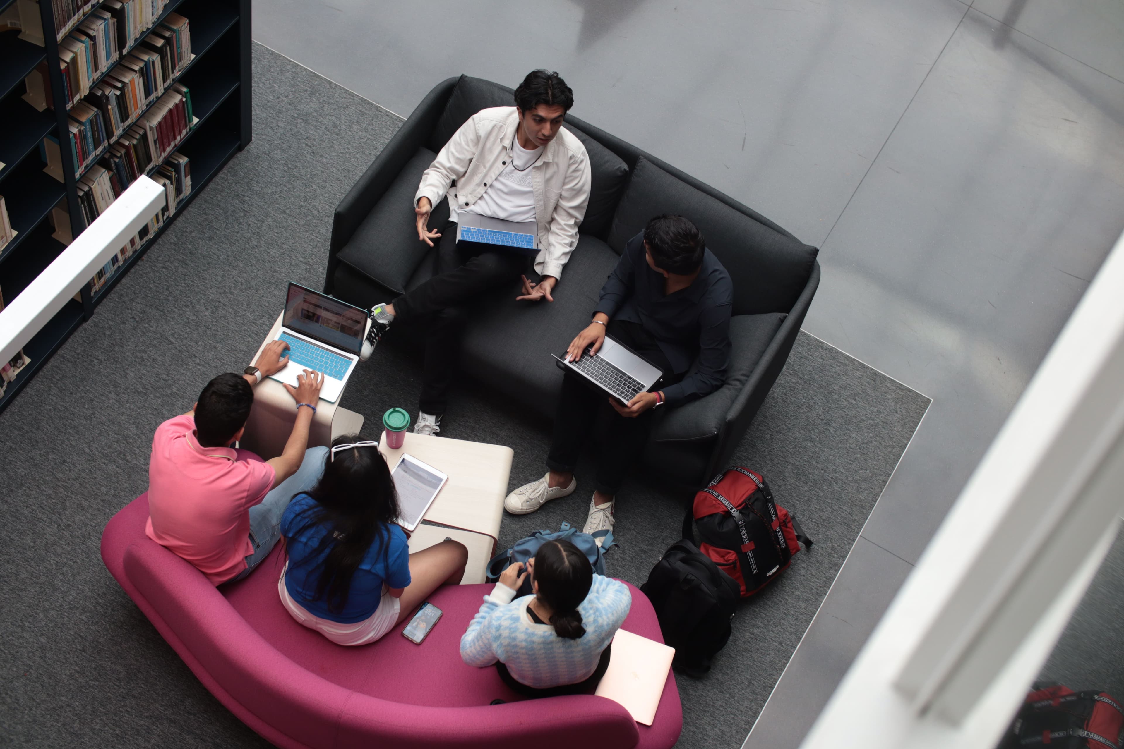 Students collaborating on a laptop